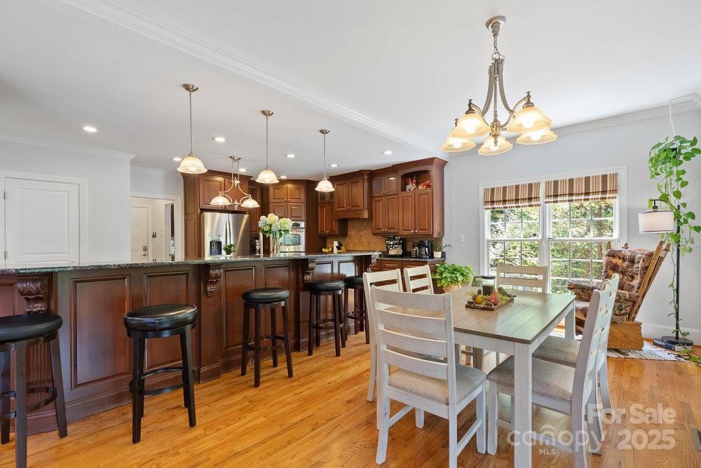 134 Brightmore Circle Rutherfordton, NC 28139 - Photo 10 of 40 a view of a dining room with furniture window and outside view