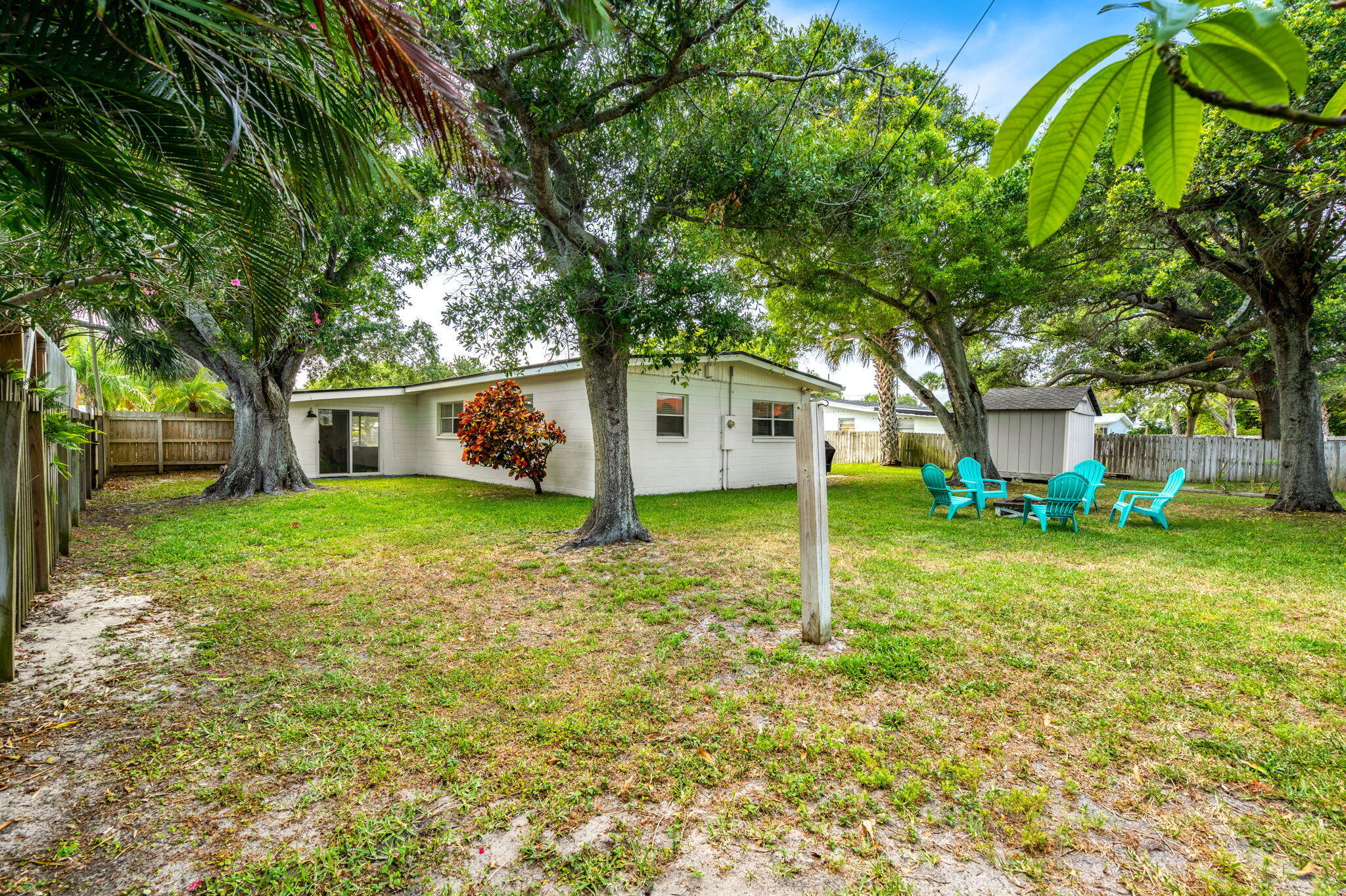 994 Samar Road Cocoa Beach, FL 32931 - Photo 31 of 34 a house that has a tree in front of it