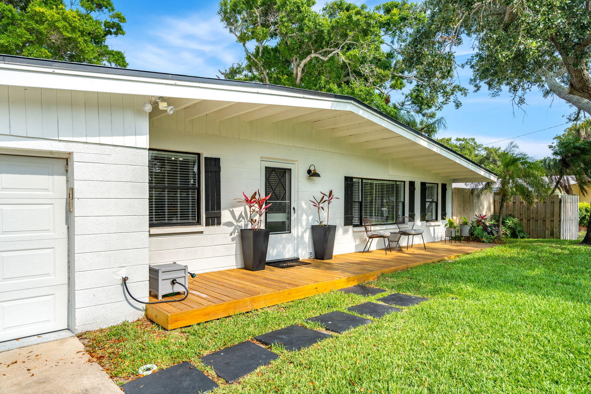 994 Samar Road Cocoa Beach, FL 32931 - Photo 5 of 34 a view of a house with pool and sitting area