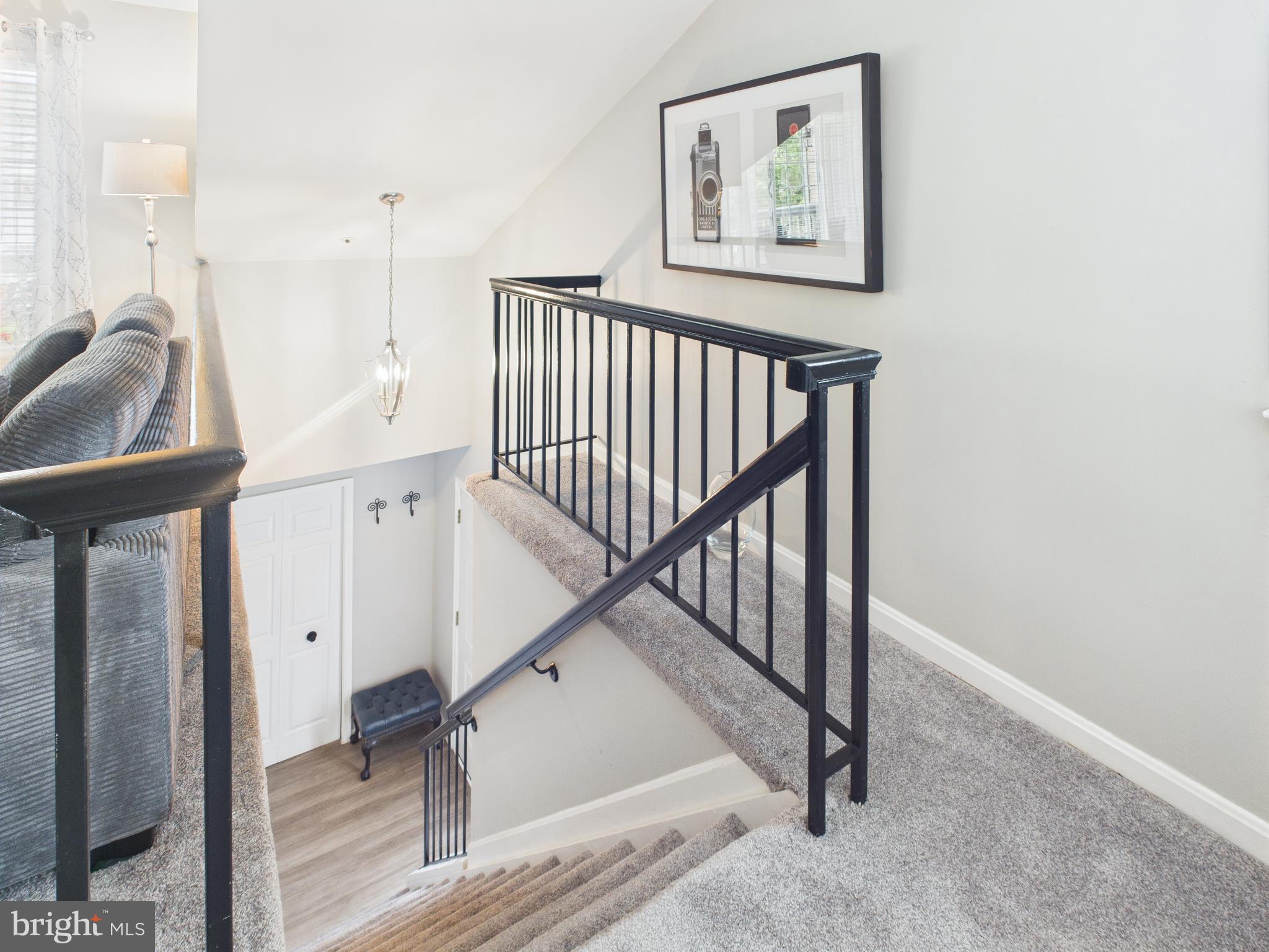 11269 Raging Brook Drive, Unit 258 Bowie, MD 20720 - Photo 8 of 36 a view of hallway with stairs