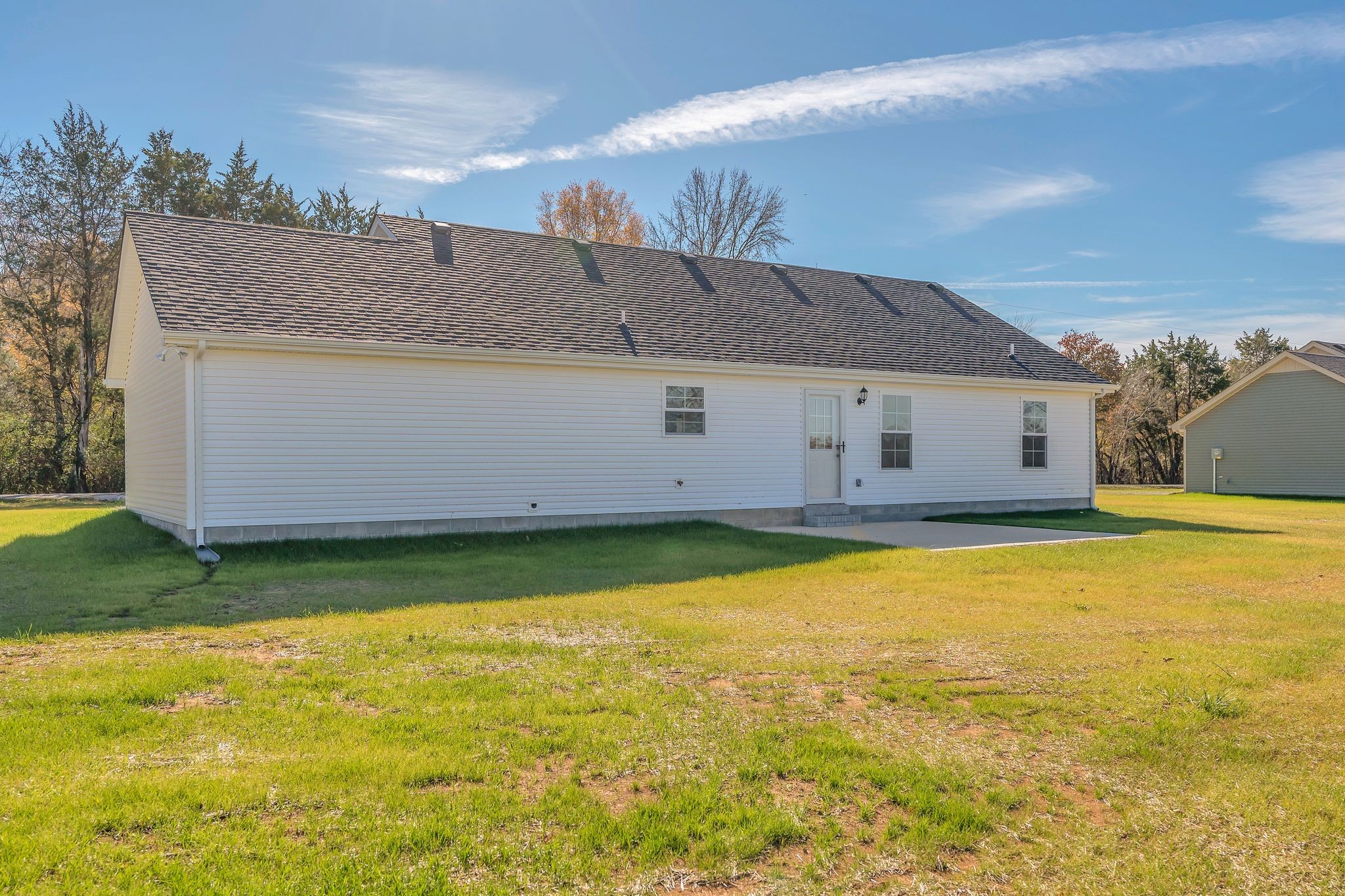 585 Paynes Church Road Winchester, TN 37398 - Photo 36 of 36 a view of a swimming pool with an outdoor space and seating area