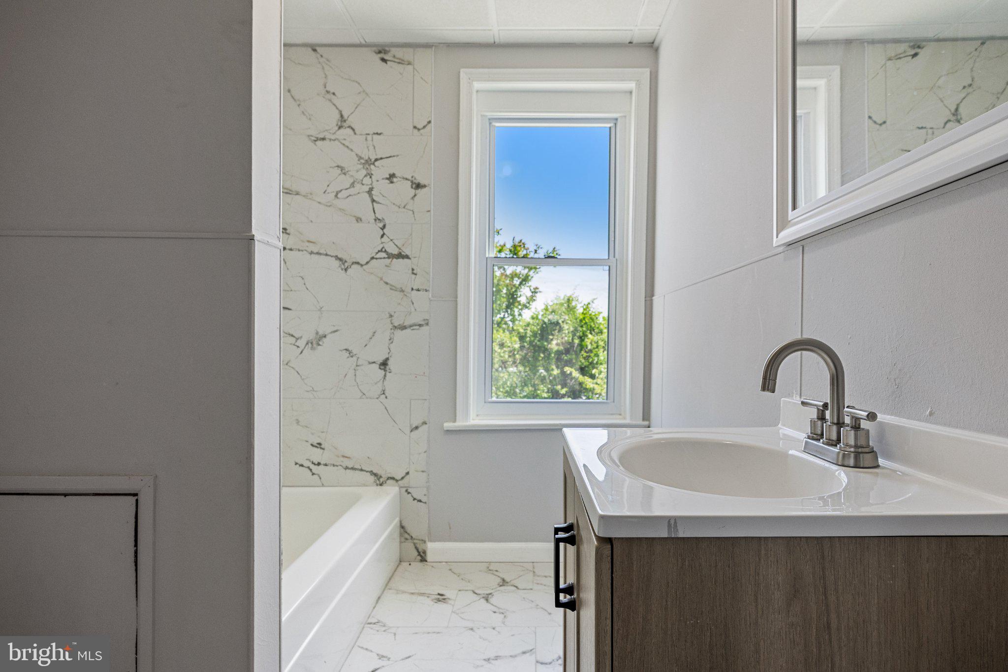 59 North Keystone Avenue Upper Darby, PA 19082 - Photo 17 of 27 Bright and airy modern bathroom retreat.