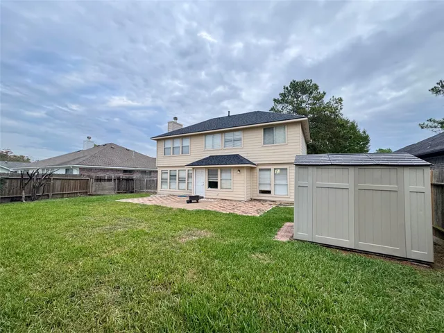 a house view with a garden space