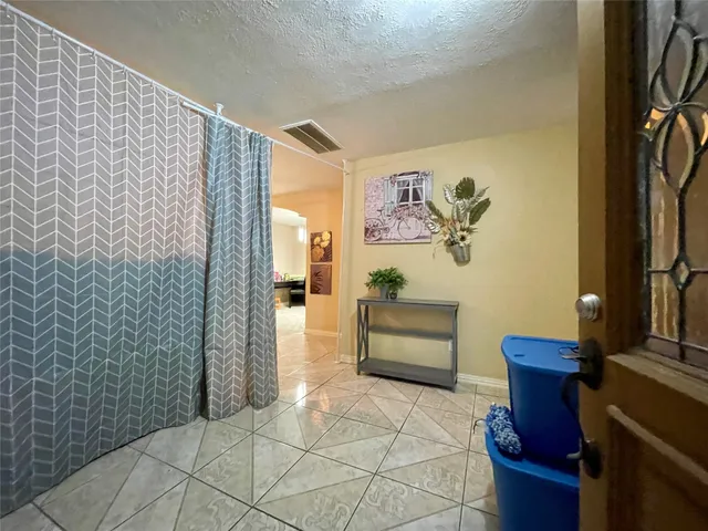 a bathroom with a bathtub and sink