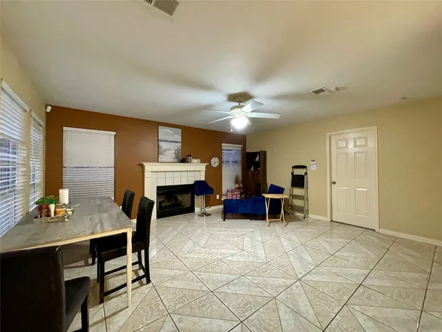 a view of a livingroom with furniture and a fireplace
