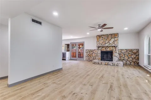 a view of a livingroom with a fireplace