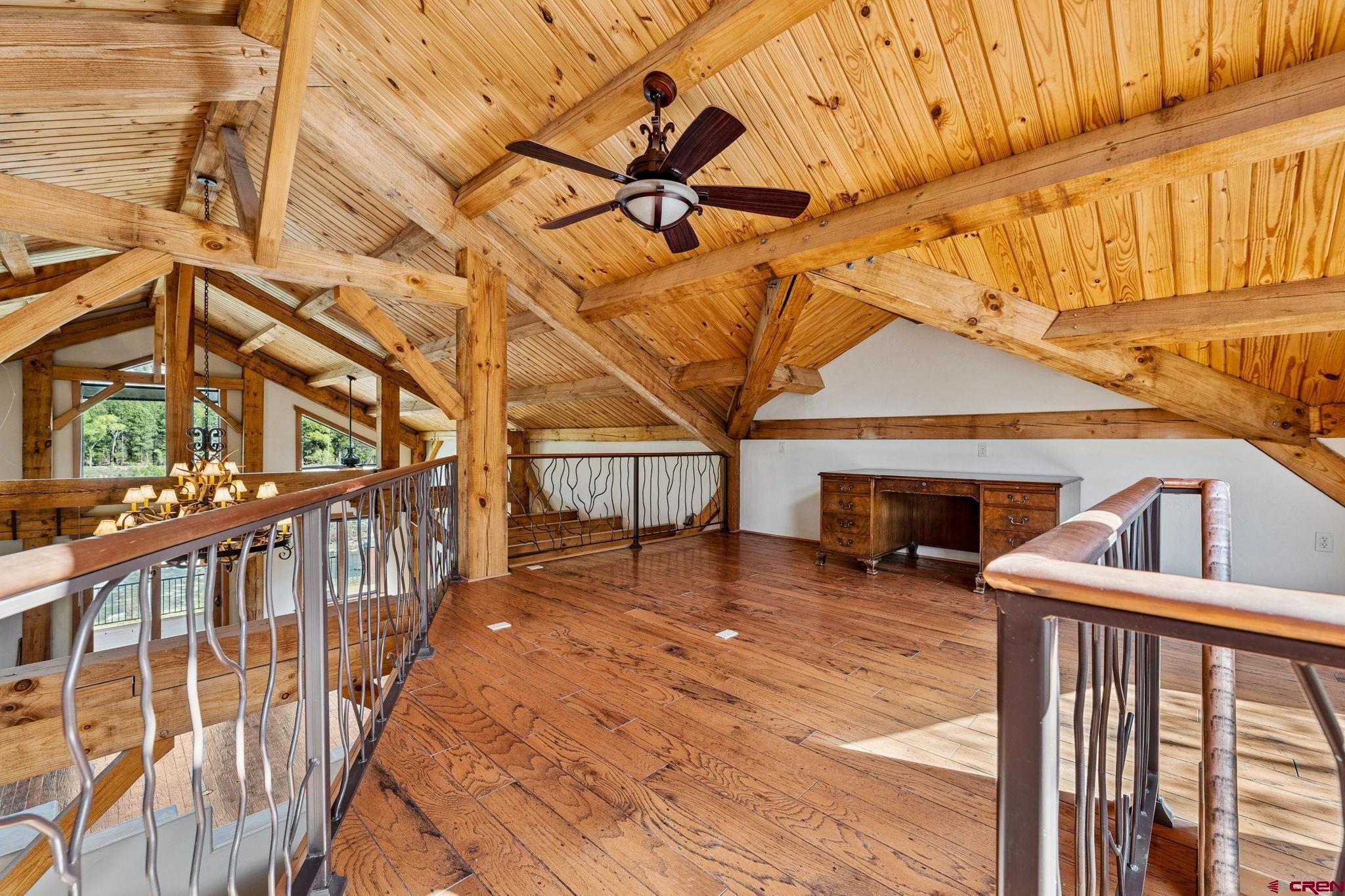 300 Animas Springs Road Durango, CO 81301 - Photo 26 of 44 a view of a house with wooden deck