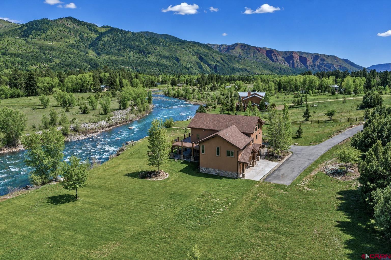 300 Animas Springs Road Durango, CO 81301 - Photo 4 of 44 an aerial view of a house with a yard