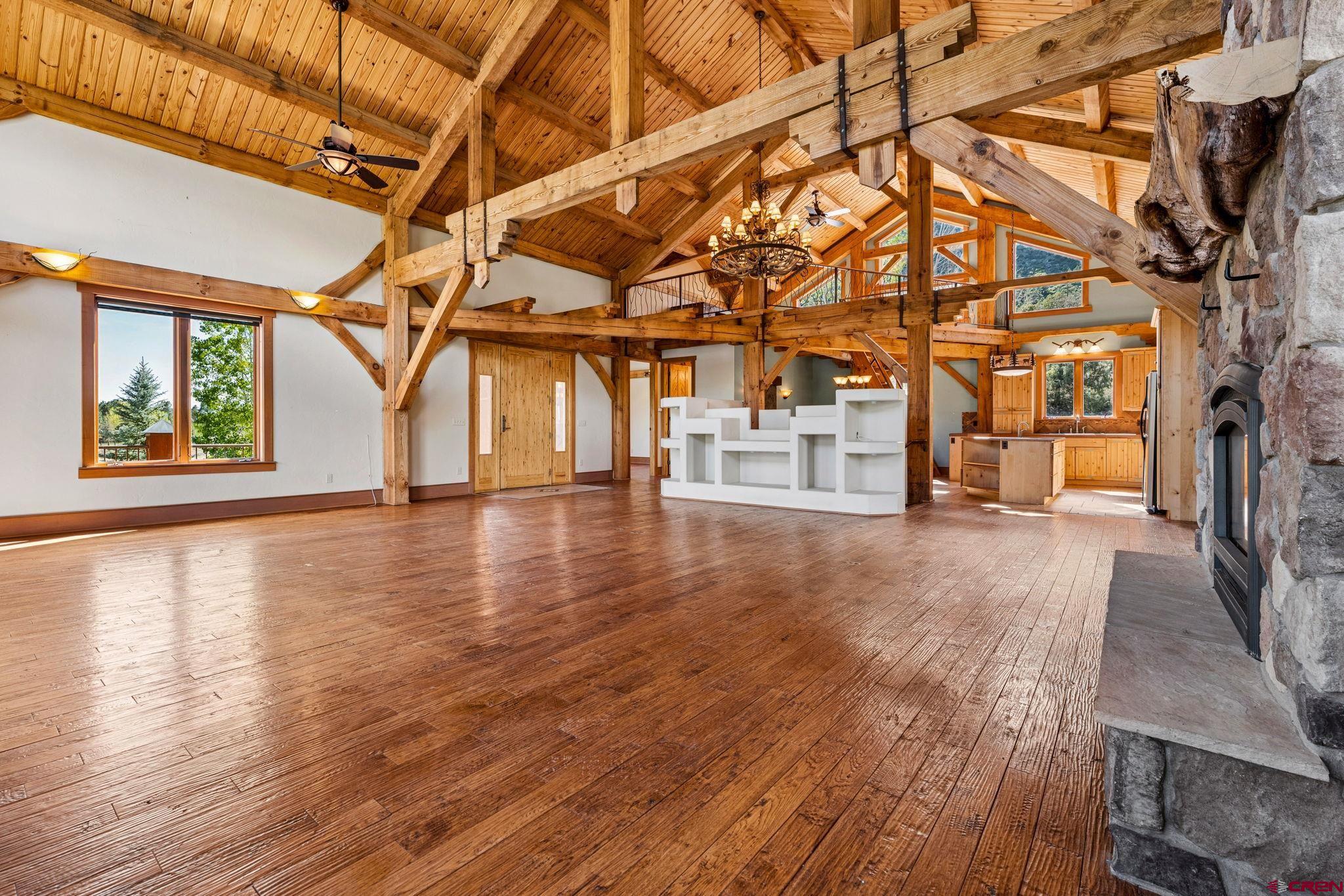 300 Animas Springs Road Durango, CO 81301 - Photo 8 of 44 a view of a room with wooden floor