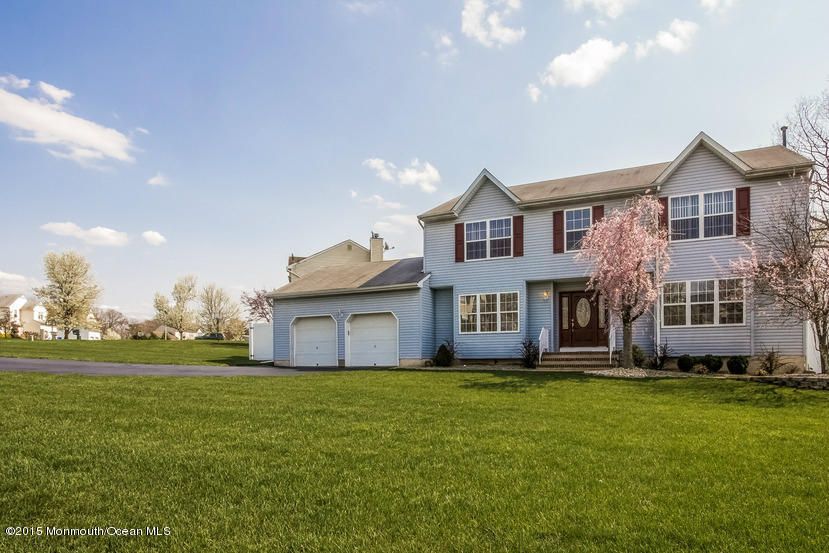 17 Rizzo Court Howell, NJ 07731 - Photo 1 of 15 a front view of house with yard and green space