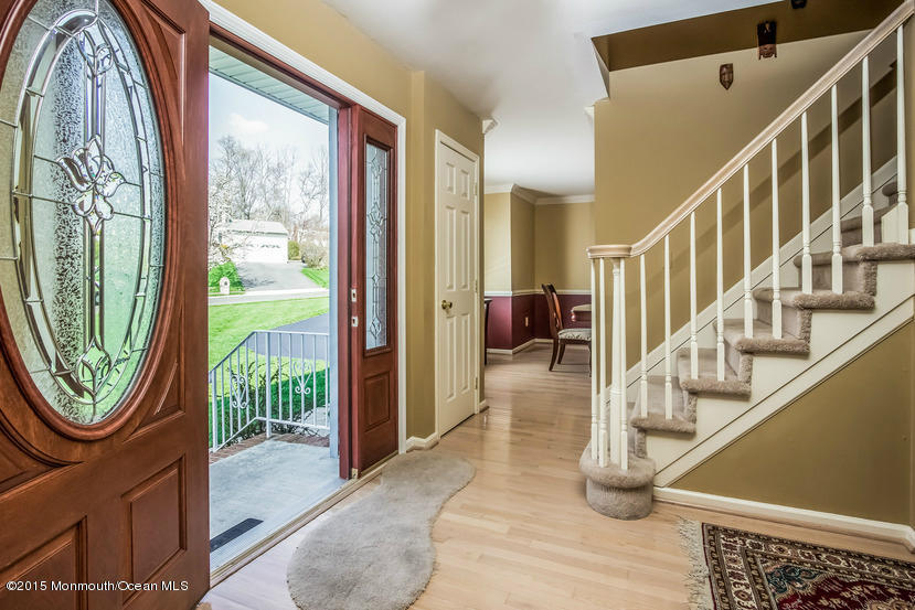 17 Rizzo Court Howell, NJ 07731 - Photo 2 of 15 a view of an entryway with garden