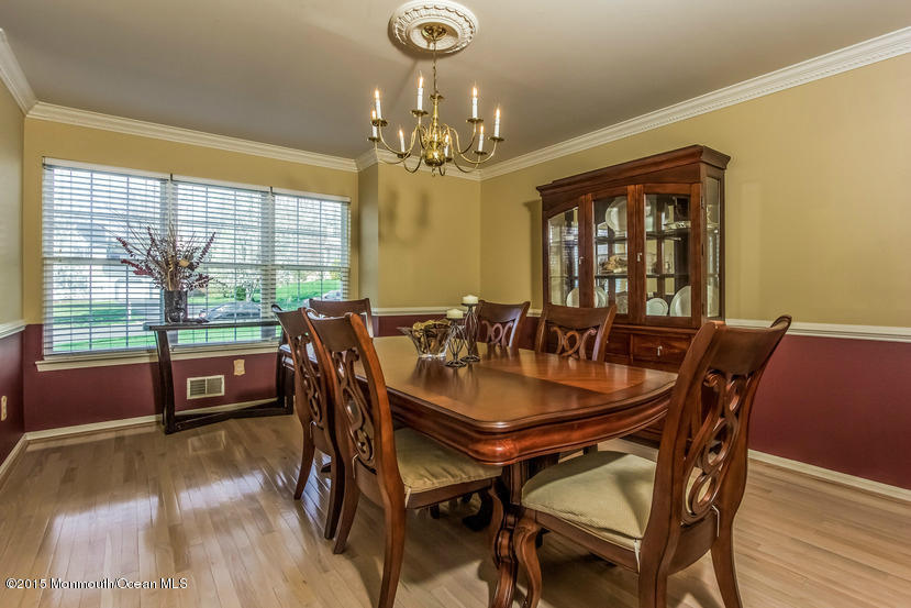 17 Rizzo Court Howell, NJ 07731 - Photo 4 of 15 a dining room with furniture window and wooden floor