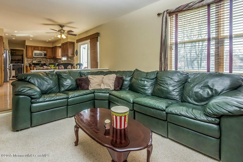 17 Rizzo Court Howell, NJ 07731 - Photo 6 of 15 a living room with furniture and a large window