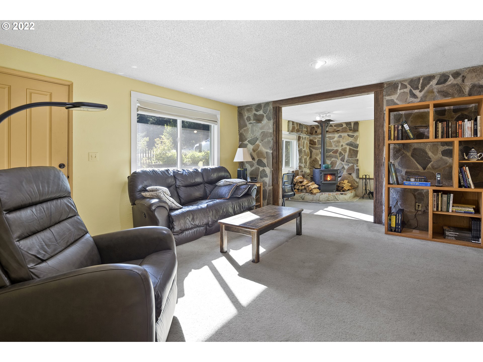 21915 South Green Mountain Road Colton, OR 97017 - Photo 4 of 32 a living room with furniture and a large window