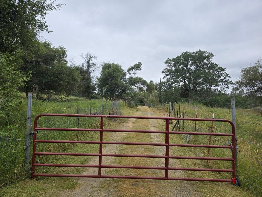 28826 Auberry Road Prather, CA 93651 - Photo 12 of 48 a view of a bench in the middle of a lake