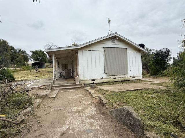 28826 Auberry Road Prather, CA 93651 - Photo 28 of 48 a view of a house with backyard and garden