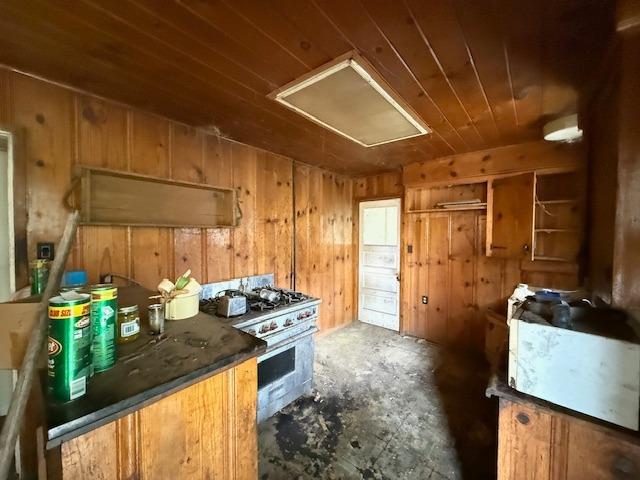 28826 Auberry Road Prather, CA 93651 - Photo 35 of 48 a kitchen with stainless steel appliances granite countertop a stove and a refrigerator