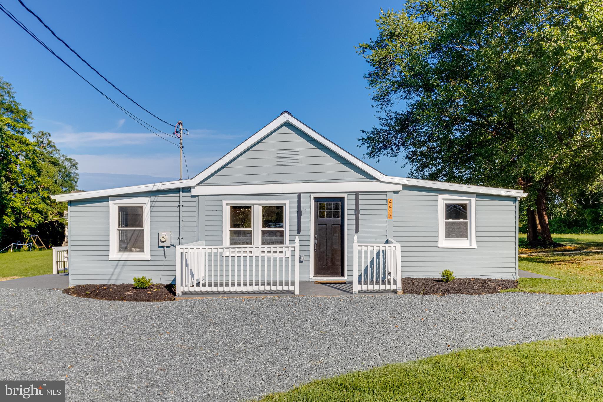 4417 Walnut Road Halethorpe, MD 21227 - Photo 2 of 44 a front view of a house with garage