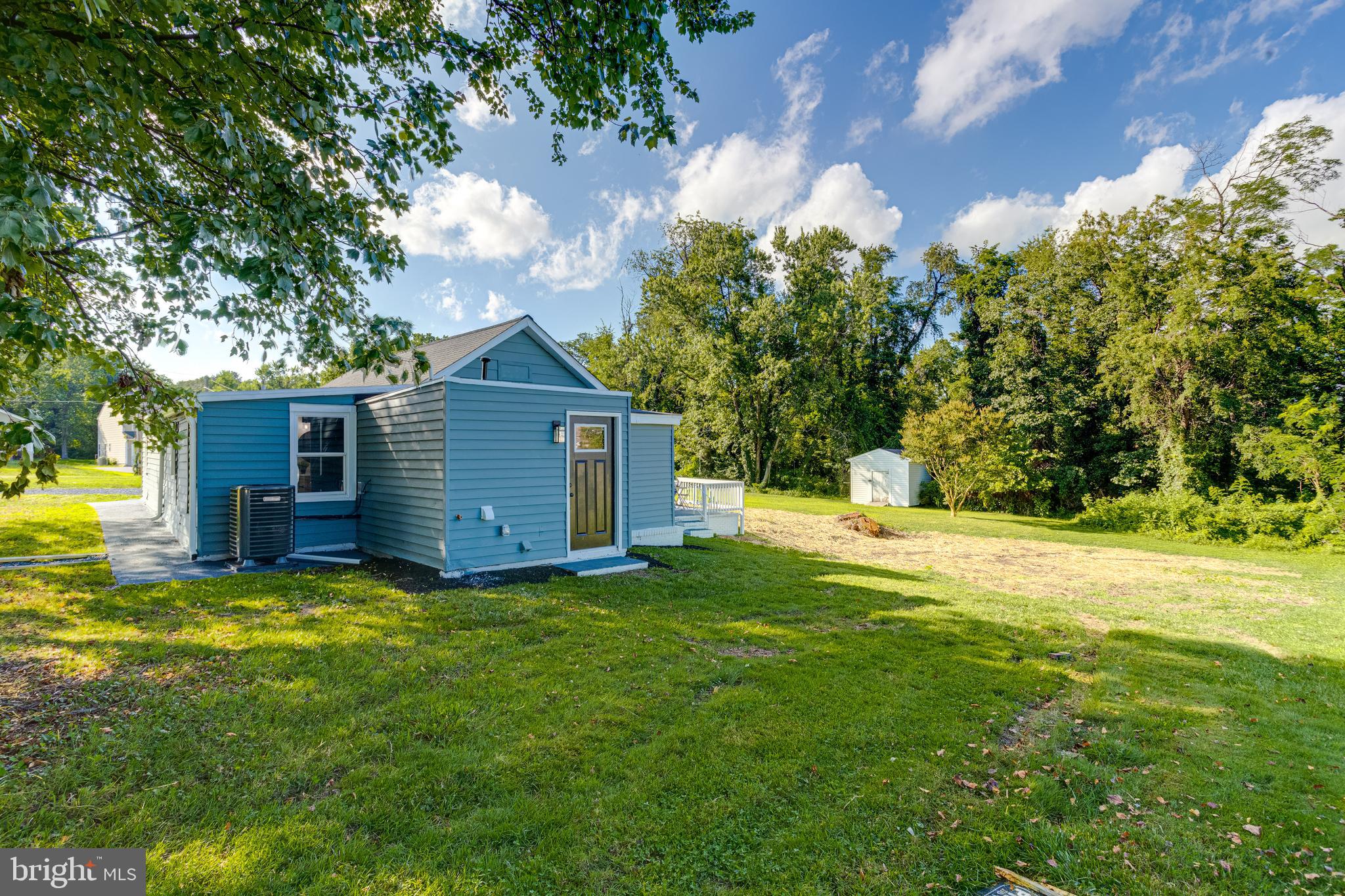 4417 Walnut Road Halethorpe, MD 21227 - Photo 41 of 44 a view of a house with a yard