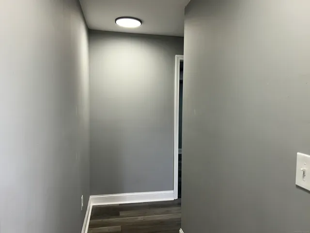 a view of small space with racks on the wall