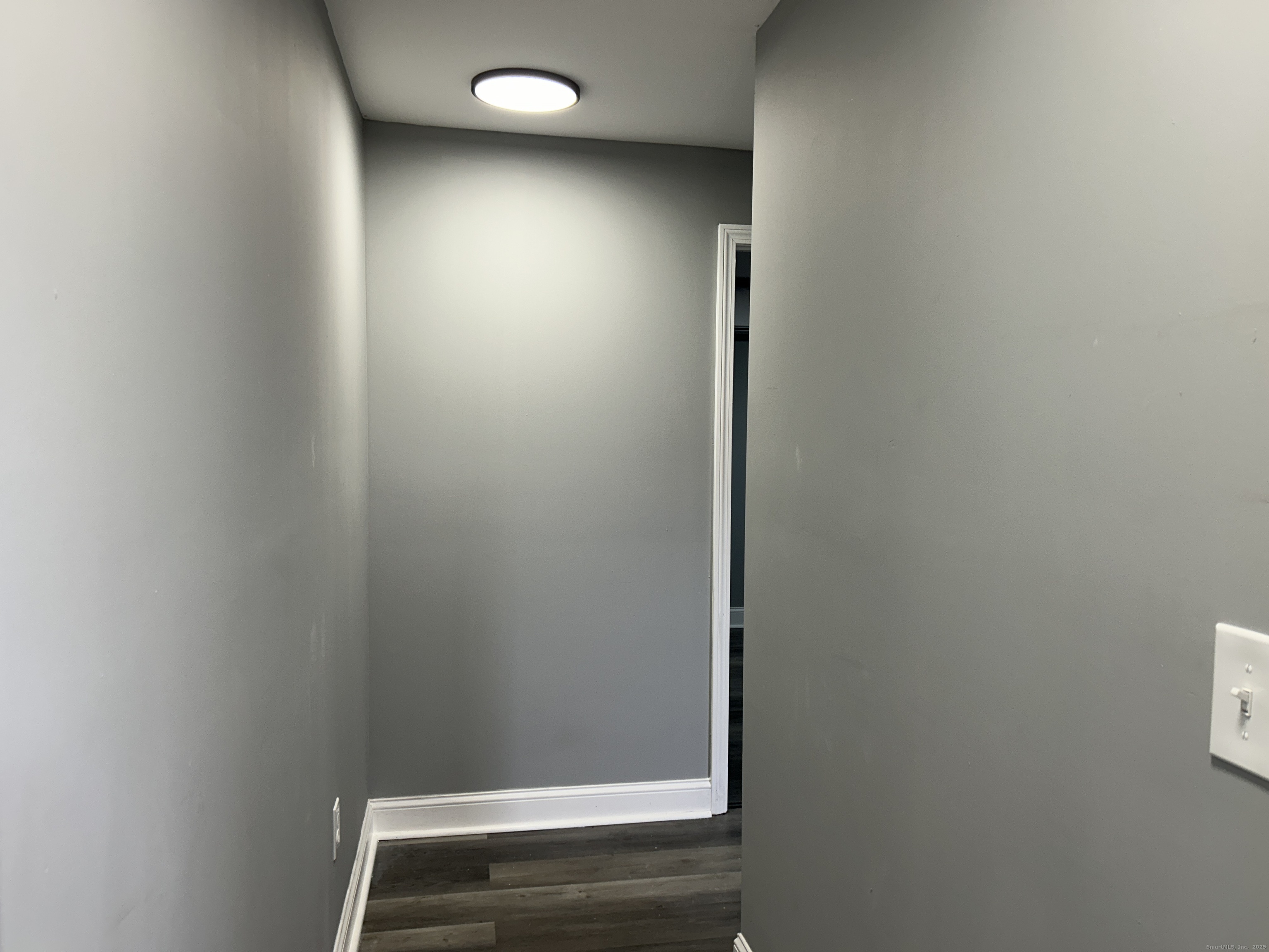 22 Hawthorne Street, Unit 1 Norwich, CT 06360 - Photo 15 of 22 a view of small space with racks on the wall