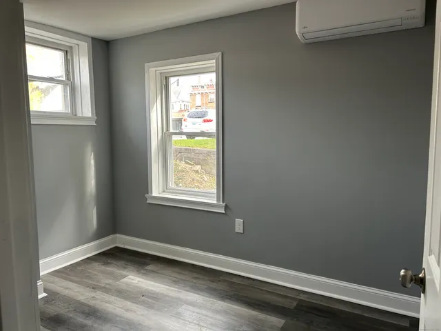 an empty room with windows