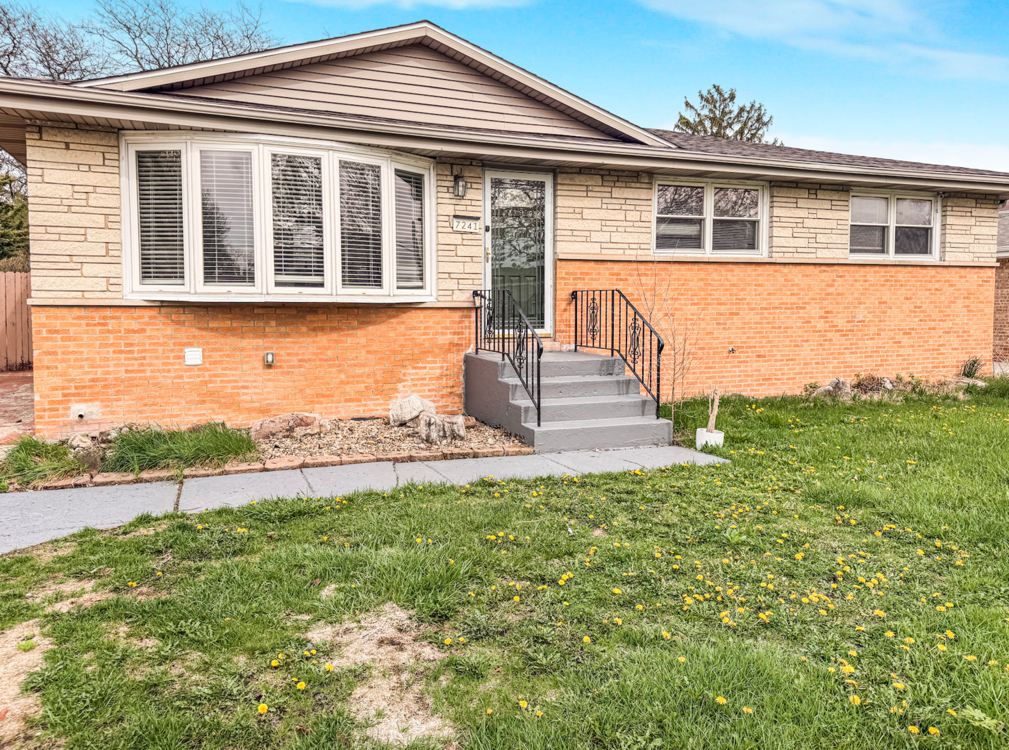 7241 Beloit Avenue Bridgeview, IL 60455 - Photo 1 of 26 front view of a house with a yard