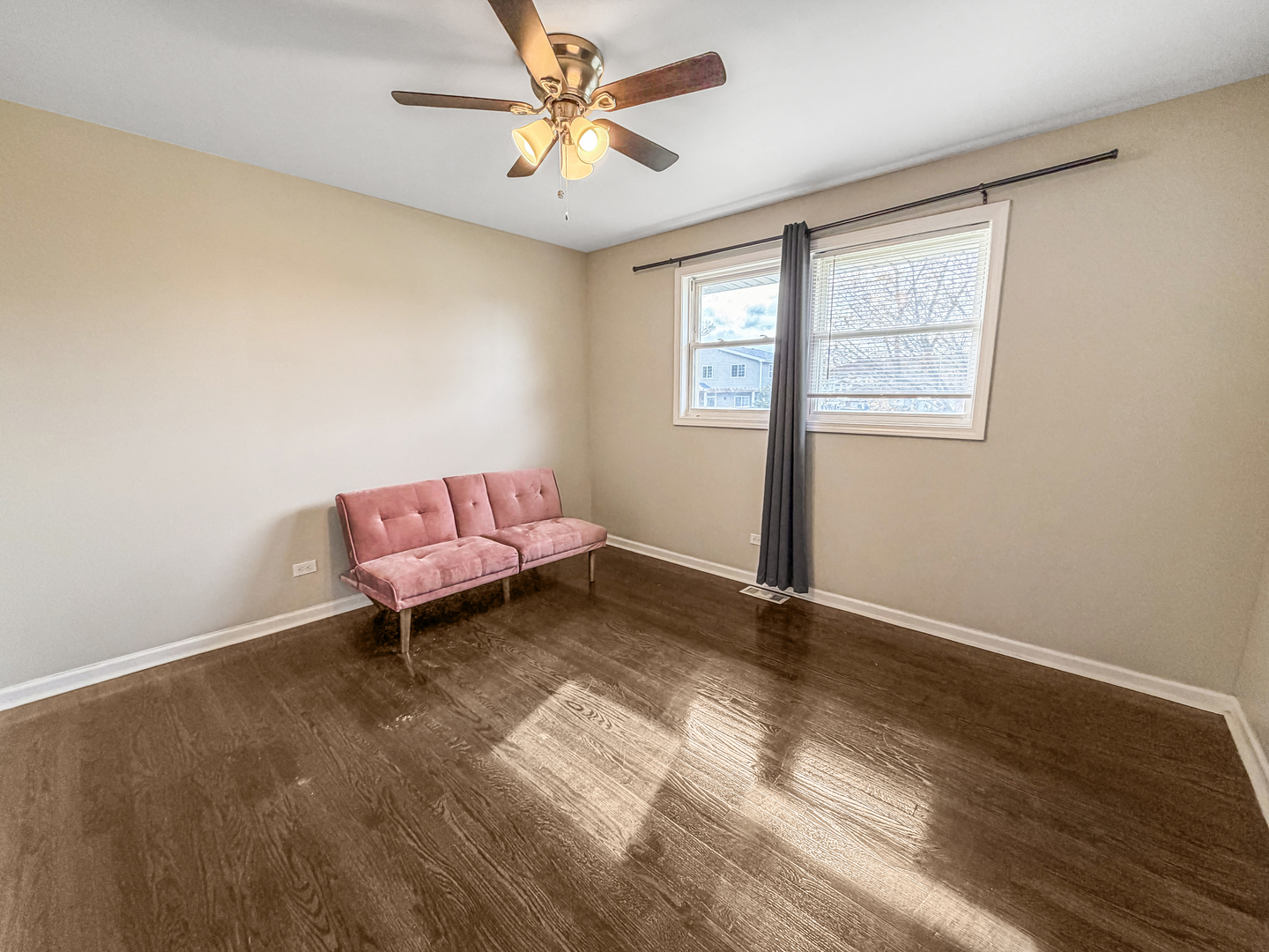 7241 Beloit Avenue Bridgeview, IL 60455 - Photo 13 of 26 a living room with a window