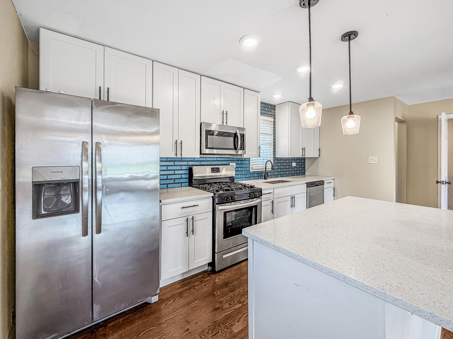 7241 Beloit Avenue Bridgeview, IL 60455 - Photo 8 of 26 a kitchen with cabinets and stainless steel appliances