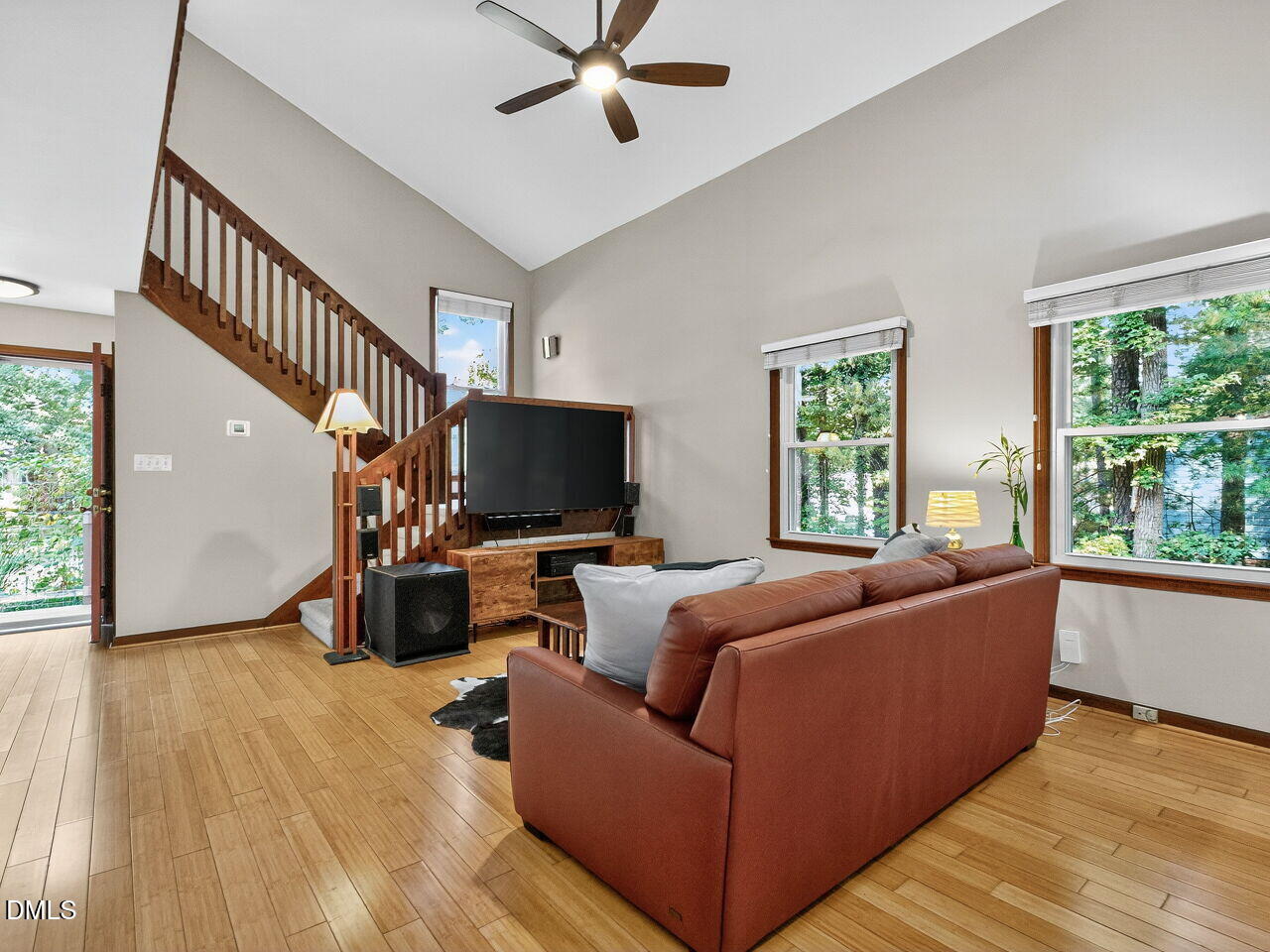 509 Holtz Lane Cary, NC 27511 - Photo 16 of 42 a living room with furniture and a flat screen tv