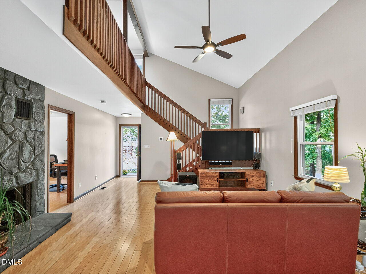 509 Holtz Lane Cary, NC 27511 - Photo 17 of 42 a living room with furniture and a flat screen tv