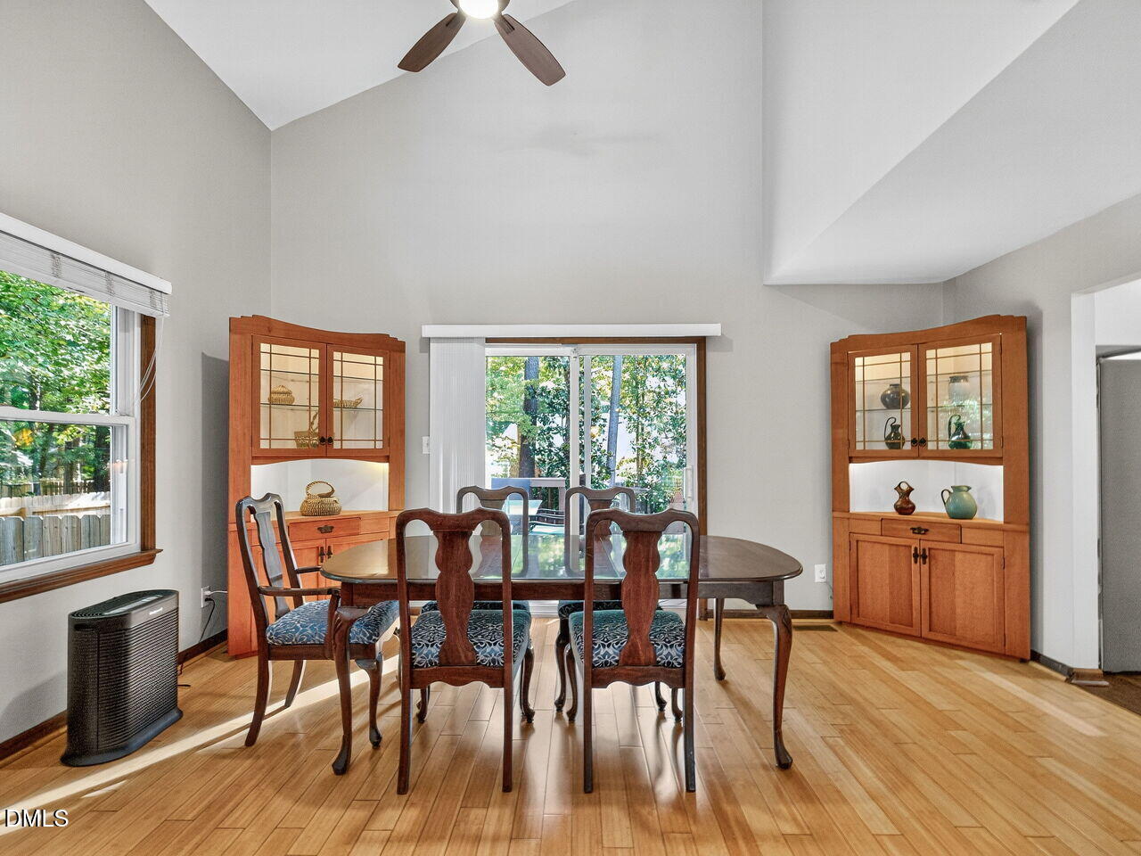 509 Holtz Lane Cary, NC 27511 - Photo 18 of 42 a view of a dining room with furniture window and wooden floor