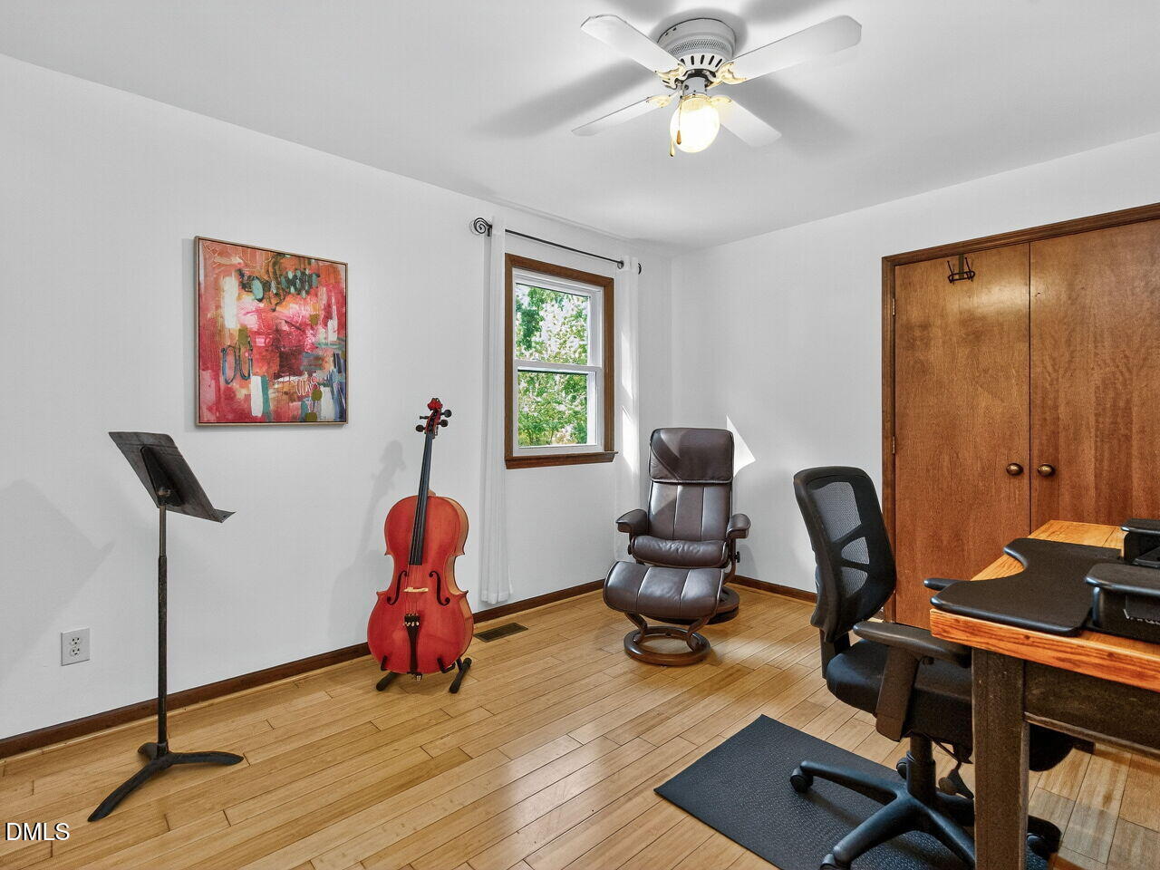 509 Holtz Lane Cary, NC 27511 - Photo 19 of 42 a room with furniture and wooden floor