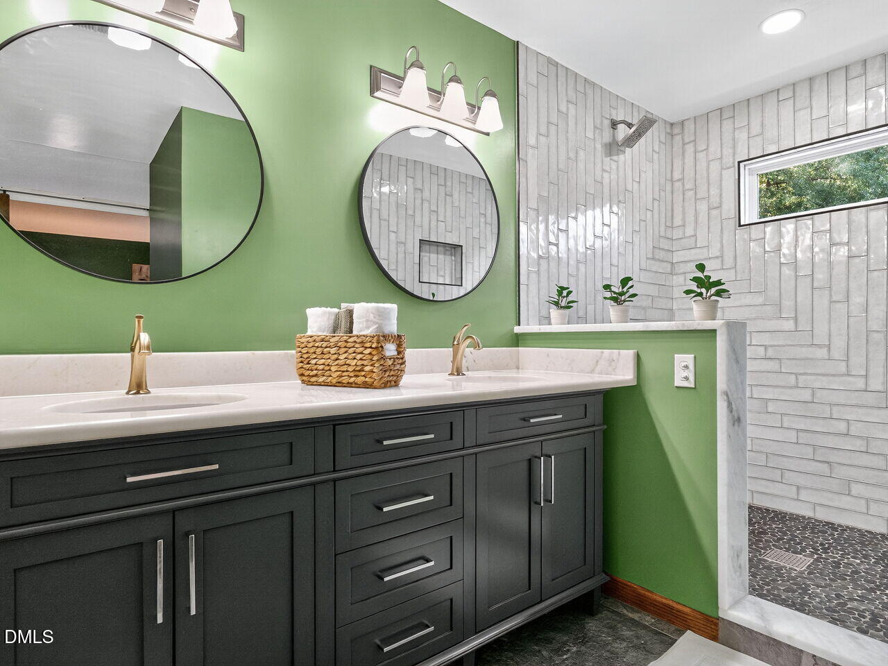 509 Holtz Lane Cary, NC 27511 - Photo 24 of 42 a bathroom with a double vanity sink and a mirror