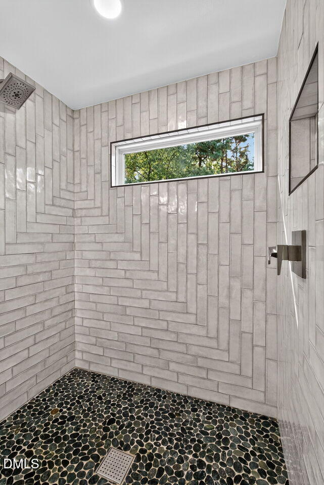 509 Holtz Lane Cary, NC 27511 - Photo 25 of 42 a bathroom with a shower