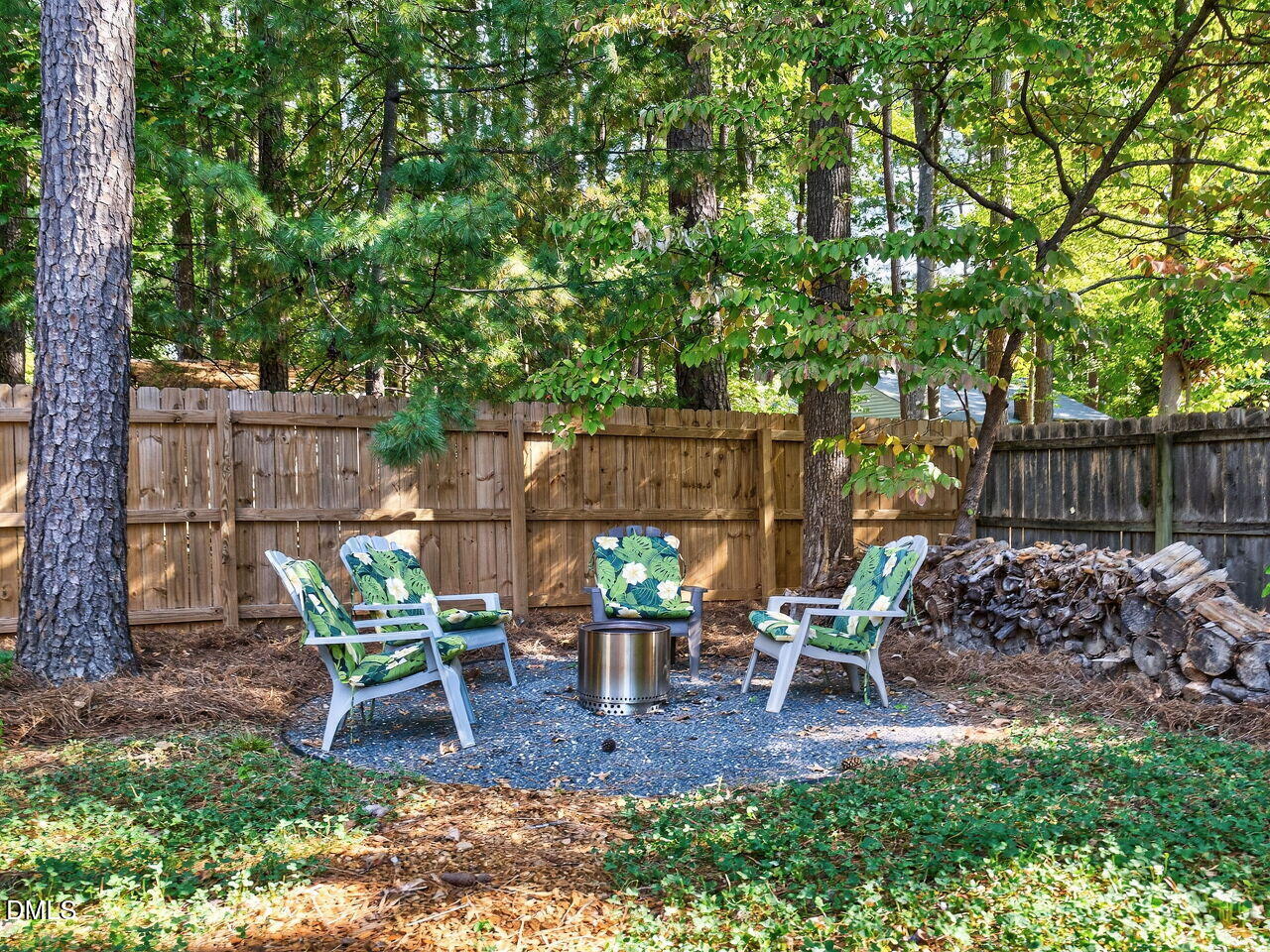 509 Holtz Lane Cary, NC 27511 - Photo 31 of 42 a view of a chairs and table in backyard