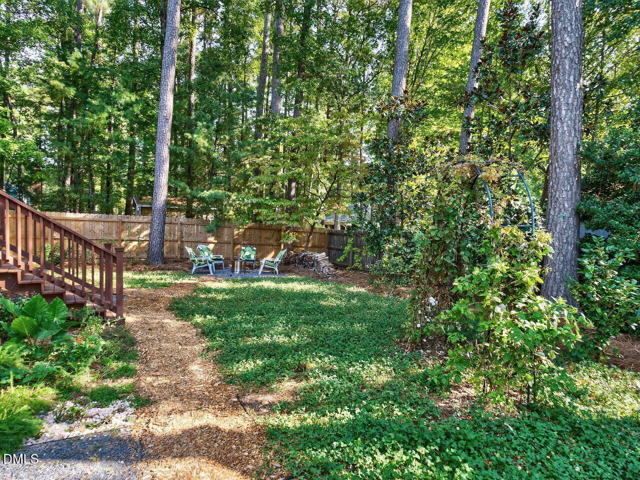 509 Holtz Lane Cary, NC 27511 - Photo 32 of 42 a view of a yard with a tree