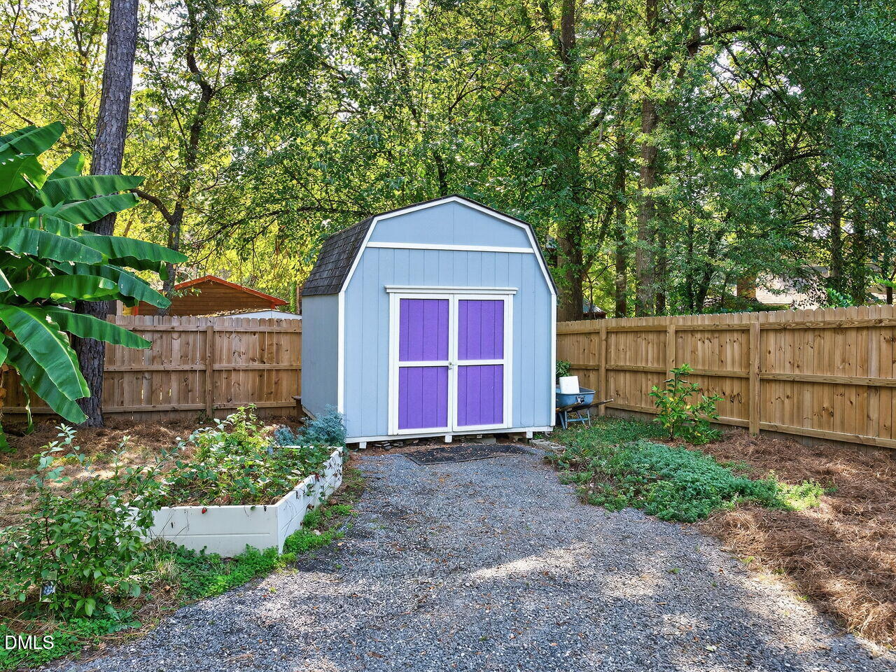 509 Holtz Lane Cary, NC 27511 - Photo 33 of 42 a front view of a house with garden