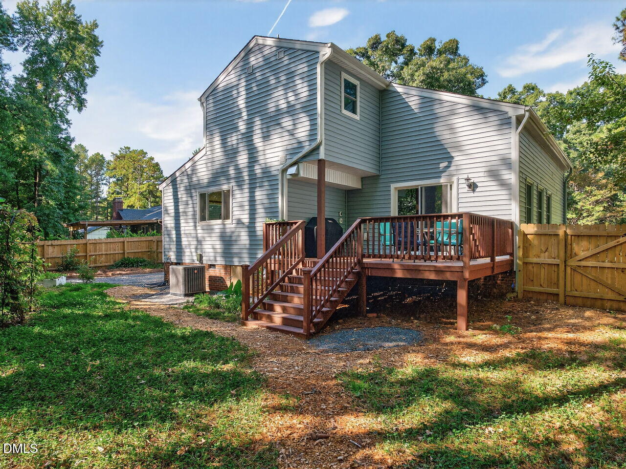 509 Holtz Lane Cary, NC 27511 - Photo 34 of 42 a house view with a sitting space and garden