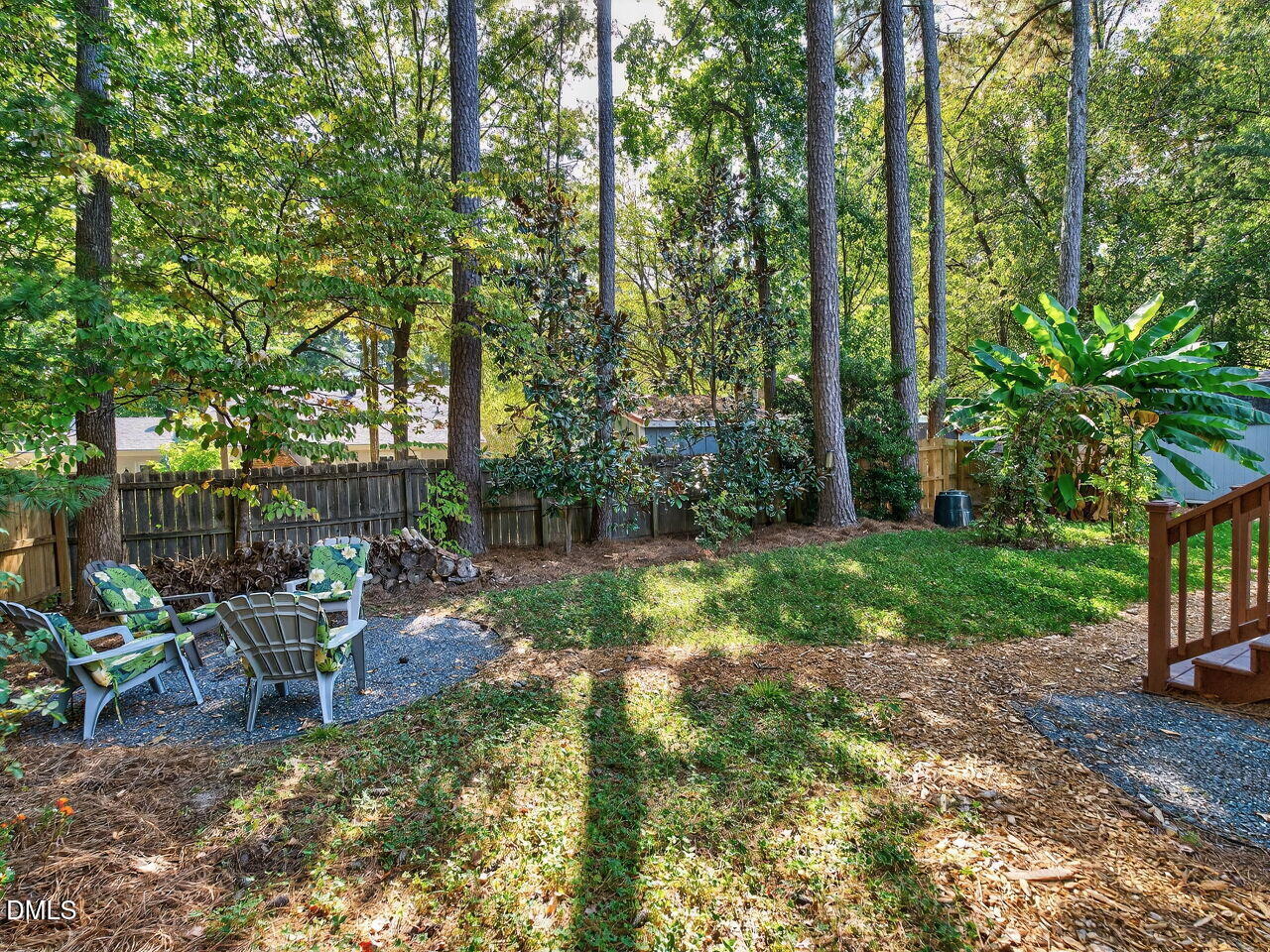 509 Holtz Lane Cary, NC 27511 - Photo 35 of 42 a view of a chair and table in backyard