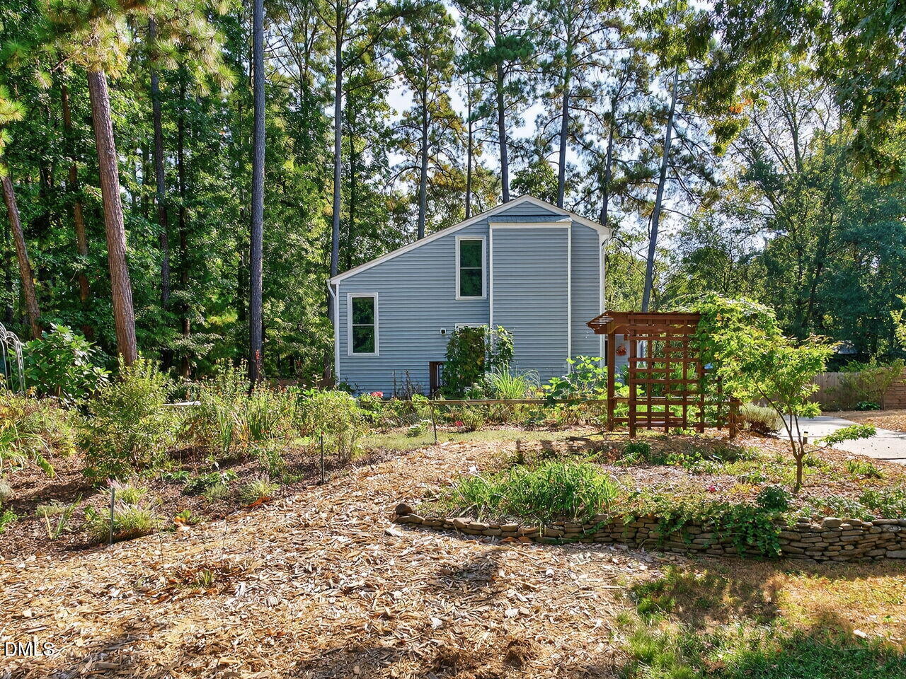 509 Holtz Lane Cary, NC 27511 - Photo 36 of 42 a front view of house with yard and green space