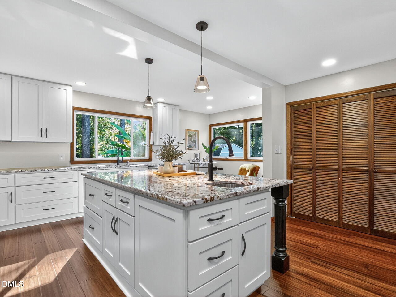 509 Holtz Lane Cary, NC 27511 - Photo 9 of 42 a kitchen with stainless steel appliances granite countertop a sink and a stove