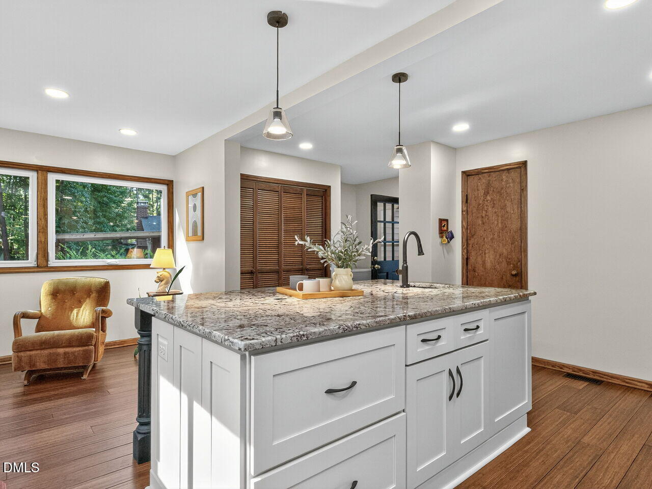 509 Holtz Lane Cary, NC 27511 - Photo 10 of 42 a bathroom with a granite countertop sink and a large mirror