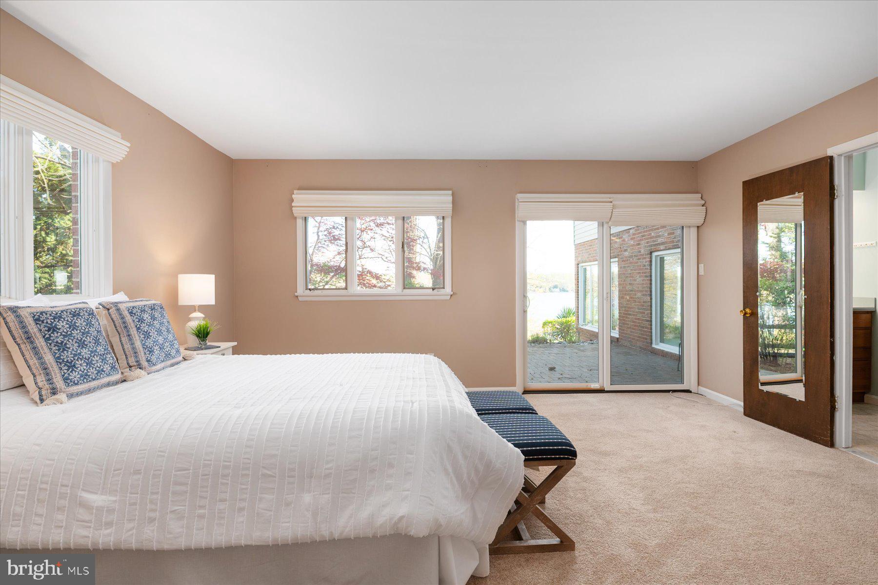 112 Park Avenue Edgewater, MD 21037 - Photo 22 of 58 Main level Primary w/ water view & private patio