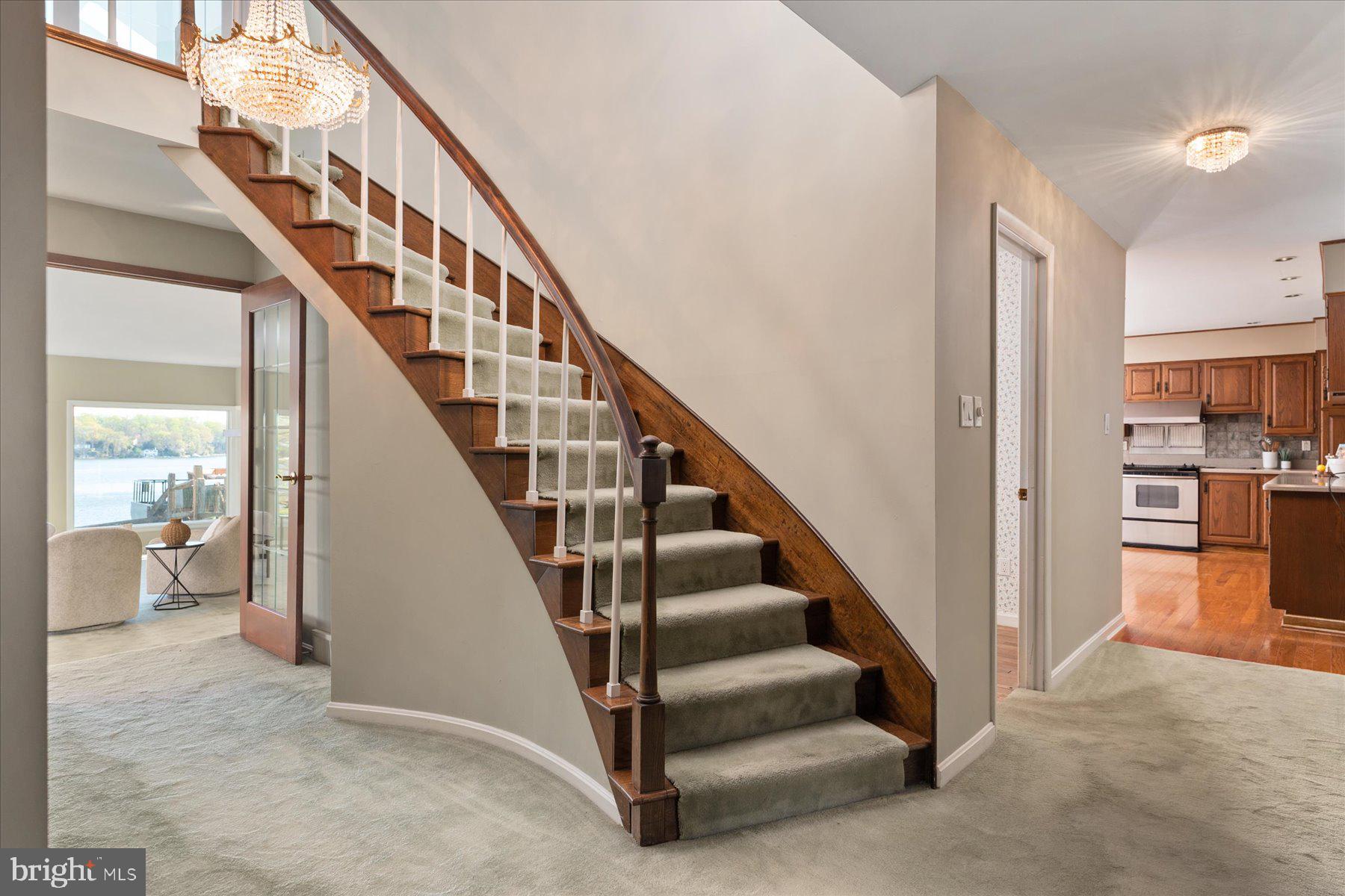 112 Park Avenue Edgewater, MD 21037 - Photo 32 of 58 Stunning staircase leading upstairs