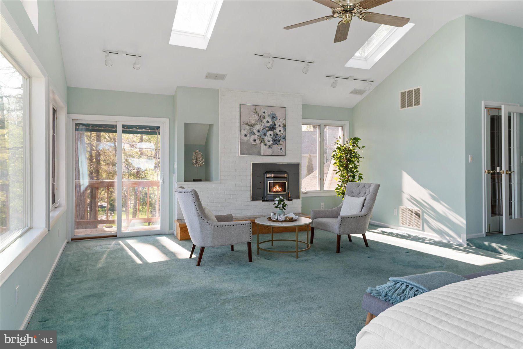 112 Park Avenue Edgewater, MD 21037 - Photo 36 of 58 Sitting area w/ pellet stove & separate entrance
