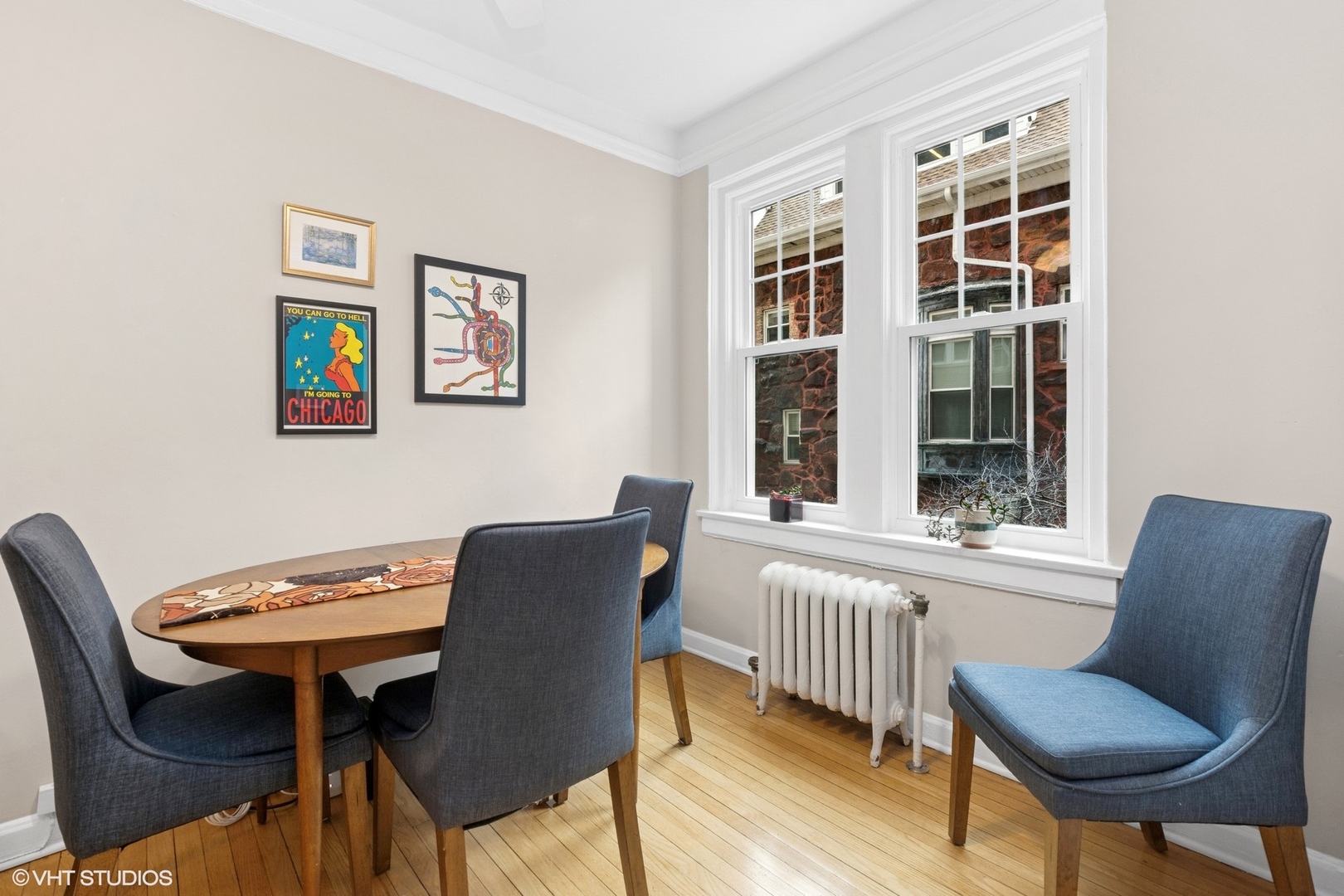 6334 North Sheridan Road, Unit 1D Chicago, IL 60660 - Photo 7 of 15 a view of a dining room with furniture and a window