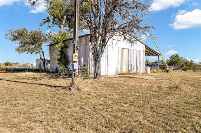 a house with trees in front of it