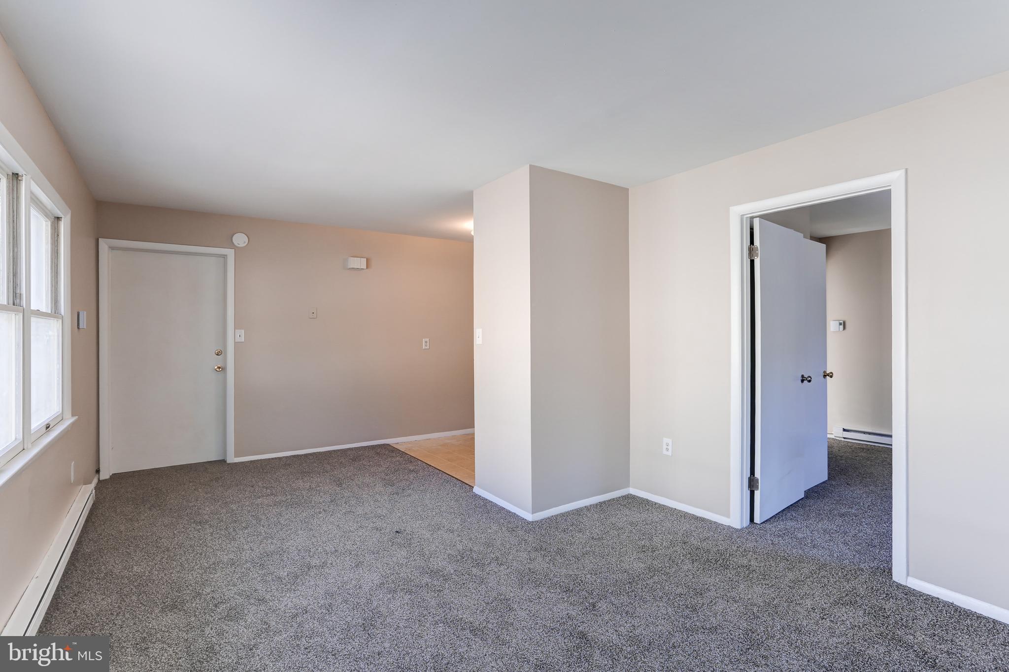 11 Poplar Street, Unit 2 Wormleysburg, PA 17043 - Photo 5 of 5 a view of an empty room and window