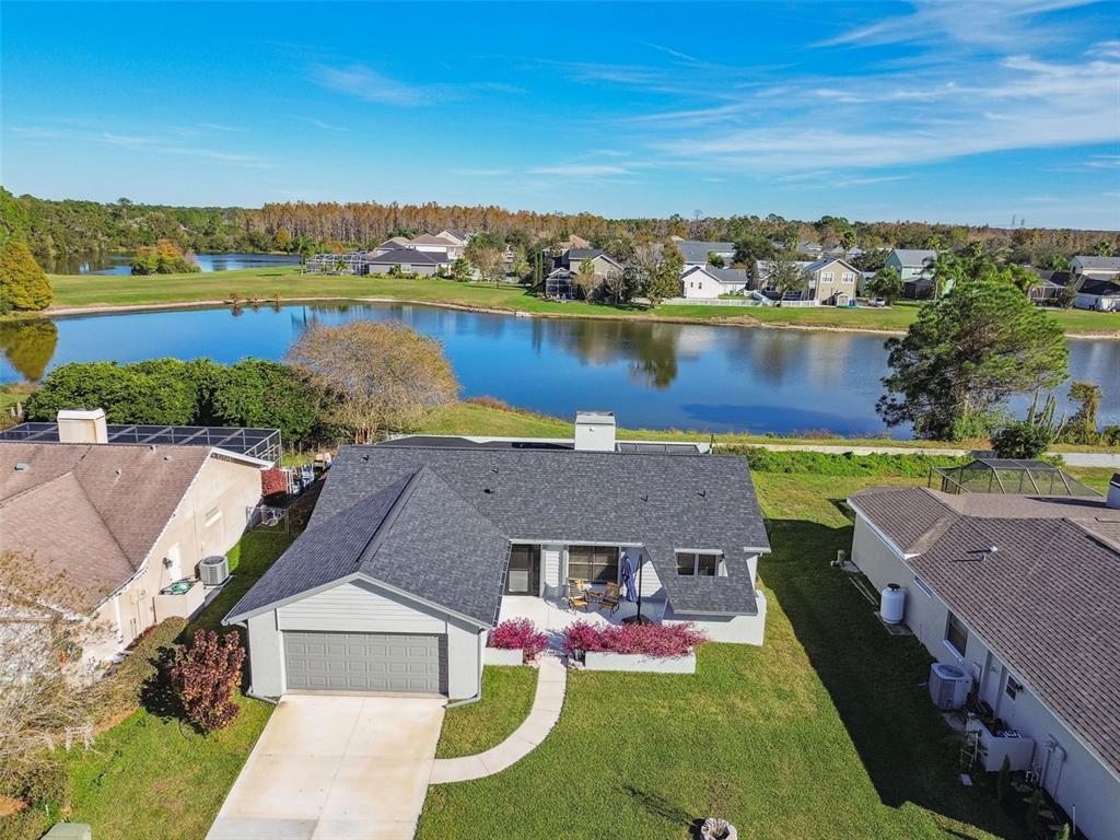 3812 Watson Drive New Port Richey, FL 34655 - Photo 1 of 1 an aerial view of a house with a garden
